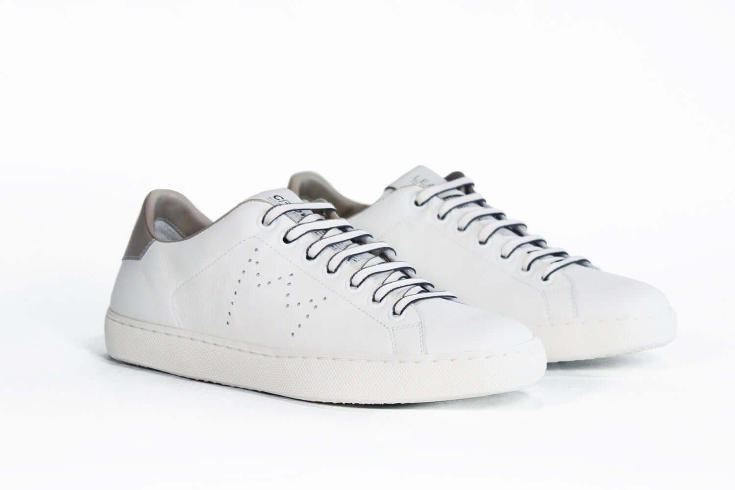 Women’s Low-Top LC06 Sneaker in White & Fawn Leather featuring fresh white and pale fawn design.
