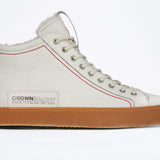 Women's ORIGINAL LC17 Fur-lined High-top in White Leather sneaker displays the red stitiching and patchwork logo, shown from the side profile.