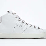 Side profile of mid top white sneaker with full leather upper with perforated crown logo and white sole.