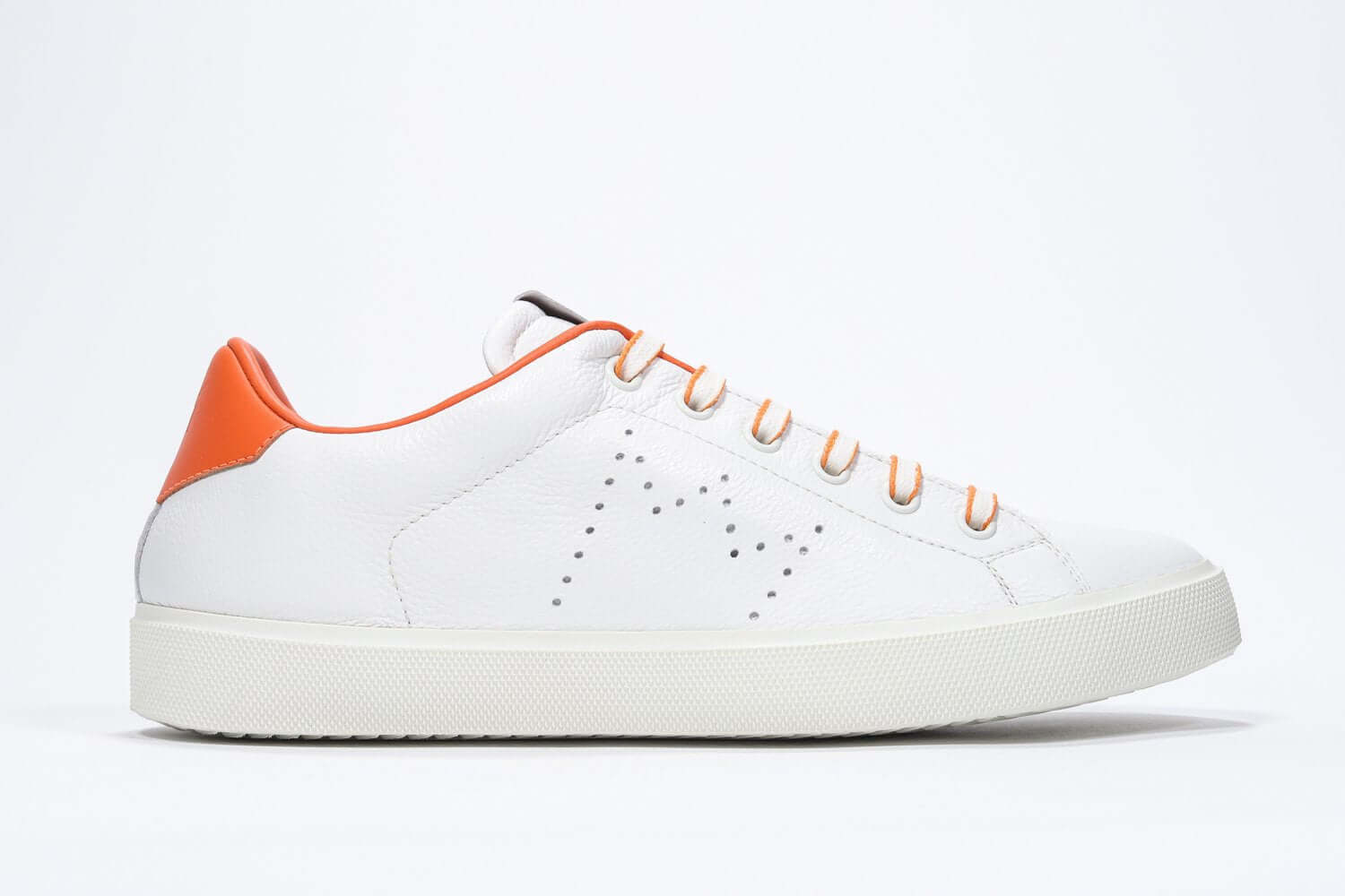 Side profile of low top white sneaker with orange detailing and perforated crown logo on upper. Full leather upper and white rubber sole.